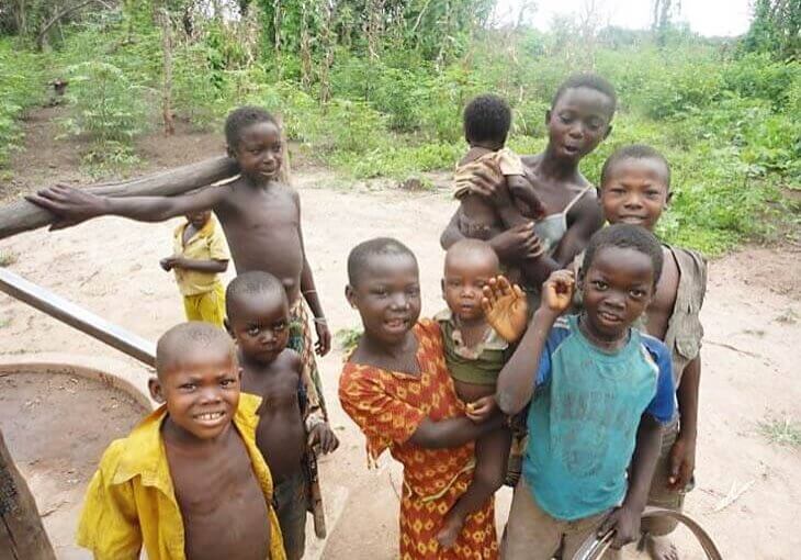 South Sudanese kids standing in field